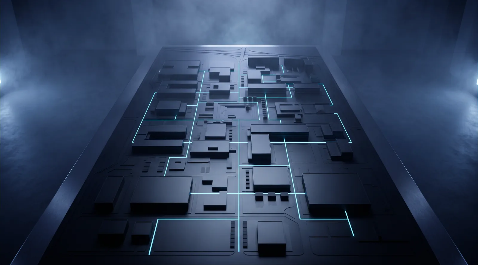 A dark architectural model of an entire company site seen from above. Buildings, yards and paths are visible at once, with thin lines tracing their connections.